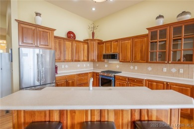 Experience elevated lakefront living at Lake of the Ozarks! One on Seasons Ridge At Four Seasons in Missouri - for sale on GolfHomes.com, golf home, golf lot