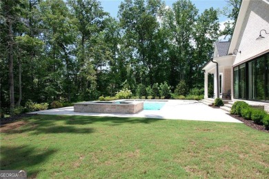 This exceptional golf course home is located in The Manor Golf on Manor Golf and Country Club in Georgia - for sale on GolfHomes.com, golf home, golf lot