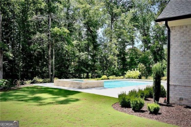 This exceptional golf course home is located in The Manor Golf on Manor Golf and Country Club in Georgia - for sale on GolfHomes.com, golf home, golf lot