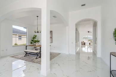 Welcome to this beautifully updated four-bedroom on Lexington Oaks Golf Club in Florida - for sale on GolfHomes.com, golf home, golf lot