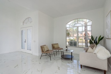 Welcome to this beautifully updated four-bedroom on Lexington Oaks Golf Club in Florida - for sale on GolfHomes.com, golf home, golf lot