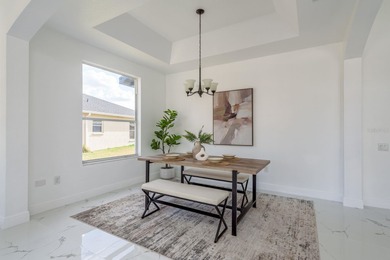 Welcome to this beautifully updated four-bedroom on Lexington Oaks Golf Club in Florida - for sale on GolfHomes.com, golf home, golf lot