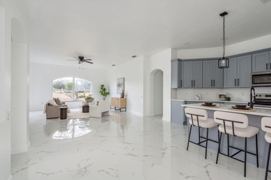 Welcome to this beautifully updated four-bedroom on Lexington Oaks Golf Club in Florida - for sale on GolfHomes.com, golf home, golf lot