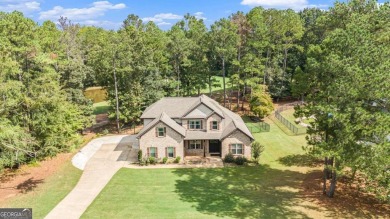 Discover this stunning Craftsman-style home featuring 4 bedrooms on Canongate At Georgia National Golf Club in Georgia - for sale on GolfHomes.com, golf home, golf lot