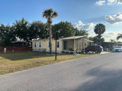 STEP INTO THIS BEAUTIFULLY UPDATED 2-BEDROOM 2-BATHROOM HOME! on Anglers Green Golf Course in Florida - for sale on GolfHomes.com, golf home, golf lot