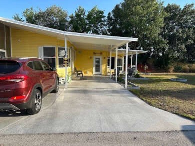 STEP INTO THIS BEAUTIFULLY UPDATED 2-BEDROOM 2-BATHROOM HOME! on Anglers Green Golf Course in Florida - for sale on GolfHomes.com, golf home, golf lot