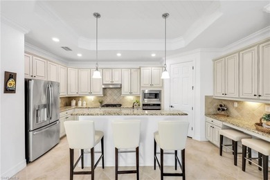 Welcome to elegant coastal living in sought after Fiddler's on The Golf Club At Fiddlers Creek in Florida - for sale on GolfHomes.com, golf home, golf lot