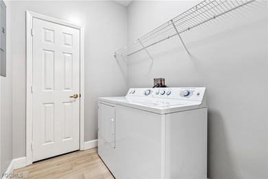 Step into elevated Florida living in this beautifully updated on Shadow Wood Preserve in Florida - for sale on GolfHomes.com, golf home, golf lot