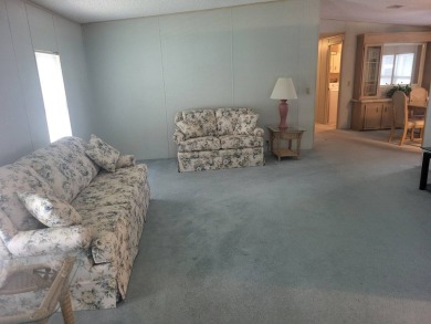 2/2 home has open floor plan. Large eat-in kitchen has lots of on Lake Henry Golf Club in Florida - for sale on GolfHomes.com, golf home, golf lot