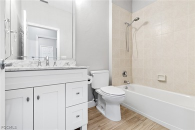 Step into elevated Florida living in this beautifully updated on Shadow Wood Preserve in Florida - for sale on GolfHomes.com, golf home, golf lot