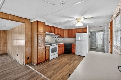 Wonderful and well-maintained mobile home with 3 bedrooms/1.5 on Betmar Acres Golf Club in Florida - for sale on GolfHomes.com, golf home, golf lot