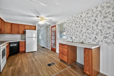 Wonderful and well-maintained mobile home with 3 bedrooms/1.5 on Betmar Acres Golf Club in Florida - for sale on GolfHomes.com, golf home, golf lot