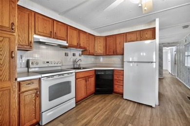 Wonderful and well-maintained mobile home with 3 bedrooms/1.5 on Betmar Acres Golf Club in Florida - for sale on GolfHomes.com, golf home, golf lot