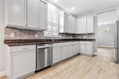 Step into elevated Florida living in this beautifully updated on Shadow Wood Preserve in Florida - for sale on GolfHomes.com, golf home, golf lot