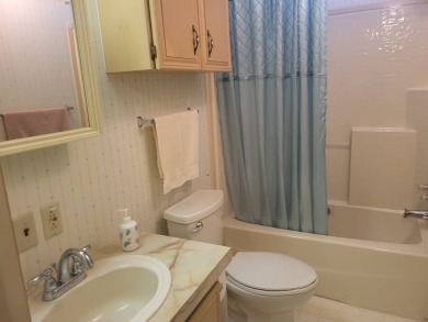 2/2 home has open floor plan. Large eat-in kitchen has lots of on Lake Henry Golf Club in Florida - for sale on GolfHomes.com, golf home, golf lot
