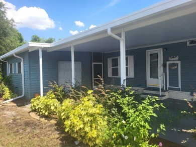 2/2 home has open floor plan. Large eat-in kitchen has lots of on Lake Henry Golf Club in Florida - for sale on GolfHomes.com, golf home, golf lot
