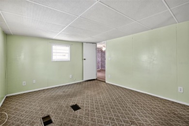Wonderful and well-maintained mobile home with 3 bedrooms/1.5 on Betmar Acres Golf Club in Florida - for sale on GolfHomes.com, golf home, golf lot