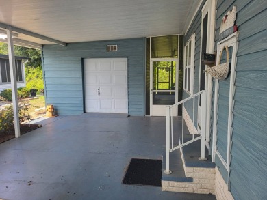 2/2 home has open floor plan. Large eat-in kitchen has lots of on Lake Henry Golf Club in Florida - for sale on GolfHomes.com, golf home, golf lot