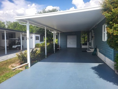 2/2 home has open floor plan. Large eat-in kitchen has lots of on Lake Henry Golf Club in Florida - for sale on GolfHomes.com, golf home, golf lot