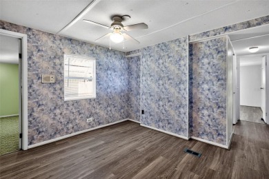 Wonderful and well-maintained mobile home with 3 bedrooms/1.5 on Betmar Acres Golf Club in Florida - for sale on GolfHomes.com, golf home, golf lot