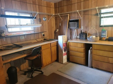 2/2 home has open floor plan. Large eat-in kitchen has lots of on Lake Henry Golf Club in Florida - for sale on GolfHomes.com, golf home, golf lot