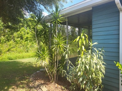 2/2 home has open floor plan. Large eat-in kitchen has lots of on Lake Henry Golf Club in Florida - for sale on GolfHomes.com, golf home, golf lot