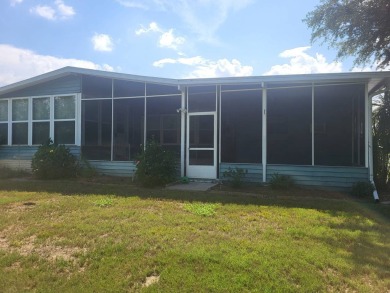2/2 home has open floor plan. Large eat-in kitchen has lots of on Lake Henry Golf Club in Florida - for sale on GolfHomes.com, golf home, golf lot