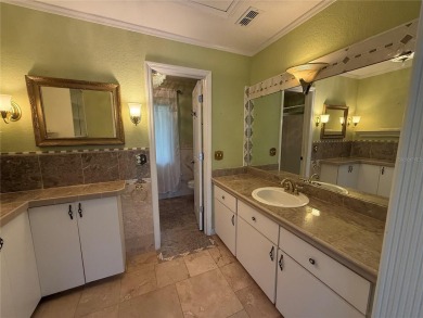 Spacious 2-bedroom, 3-bathroom home located in the active 55+ on Royal Oaks Golf Club in Florida - for sale on GolfHomes.com, golf home, golf lot