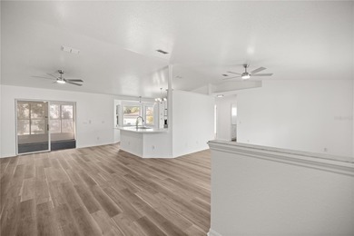 Welcome to this beautifully renovated three-bedroom on Royal Oaks Golf Club in Florida - for sale on GolfHomes.com, golf home, golf lot