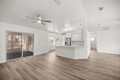 Welcome to this beautifully renovated three-bedroom on Royal Oaks Golf Club in Florida - for sale on GolfHomes.com, golf home, golf lot