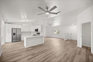 Welcome to this beautifully renovated three-bedroom on Royal Oaks Golf Club in Florida - for sale on GolfHomes.com, golf home, golf lot