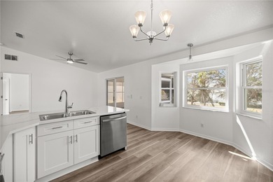 Welcome to this beautifully renovated three-bedroom on Royal Oaks Golf Club in Florida - for sale on GolfHomes.com, golf home, golf lot