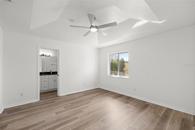 Welcome to this beautifully renovated three-bedroom on Royal Oaks Golf Club in Florida - for sale on GolfHomes.com, golf home, golf lot