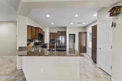 LOW MAINTENANCE AND HIGH ENTERTAINMENT!! $70K put into this home on Poston Butte Golf Club in Arizona - for sale on GolfHomes.com, golf home, golf lot