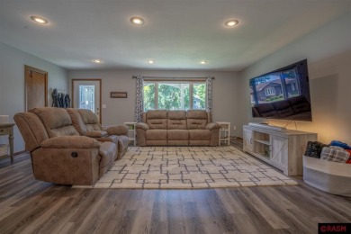 Step into this inviting 3-bedroom, 3-bathroom home where on New Ulm Country Club in Minnesota - for sale on GolfHomes.com, golf home, golf lot