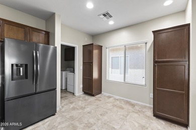 LOW MAINTENANCE AND HIGH ENTERTAINMENT!! $70K put into this home on Poston Butte Golf Club in Arizona - for sale on GolfHomes.com, golf home, golf lot