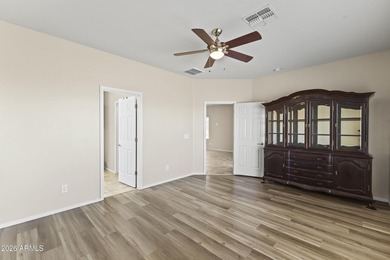 LOW MAINTENANCE AND HIGH ENTERTAINMENT!! $70K put into this home on Poston Butte Golf Club in Arizona - for sale on GolfHomes.com, golf home, golf lot