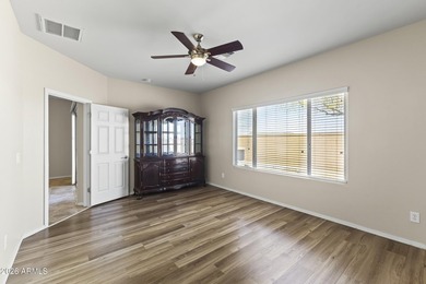 LOW MAINTENANCE AND HIGH ENTERTAINMENT!! $70K put into this home on Poston Butte Golf Club in Arizona - for sale on GolfHomes.com, golf home, golf lot