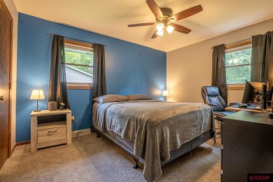 Step into this inviting 3-bedroom, 3-bathroom home where on New Ulm Country Club in Minnesota - for sale on GolfHomes.com, golf home, golf lot
