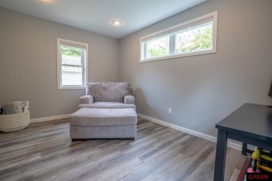 Step into this inviting 3-bedroom, 3-bathroom home where on New Ulm Country Club in Minnesota - for sale on GolfHomes.com, golf home, golf lot