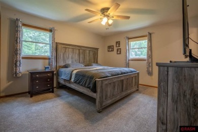 Step into this inviting 3-bedroom, 3-bathroom home where on New Ulm Country Club in Minnesota - for sale on GolfHomes.com, golf home, golf lot