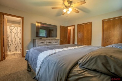 Step into this inviting 3-bedroom, 3-bathroom home where on New Ulm Country Club in Minnesota - for sale on GolfHomes.com, golf home, golf lot