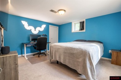 Step into this inviting 3-bedroom, 3-bathroom home where on New Ulm Country Club in Minnesota - for sale on GolfHomes.com, golf home, golf lot
