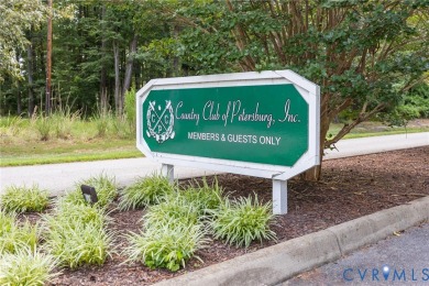 Welcome home to your maintenance free retreat! Thoughtfully on Country Club of Petersburg in Virginia - for sale on GolfHomes.com, golf home, golf lot