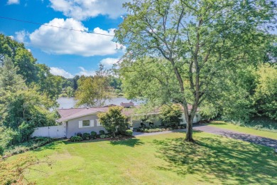 3 BD 2.5 BA 3,145-sq-ft home overlooks tranquil Mill Pond on Spruce Ridge Golf Club in Michigan - for sale on GolfHomes.com, golf home, golf lot