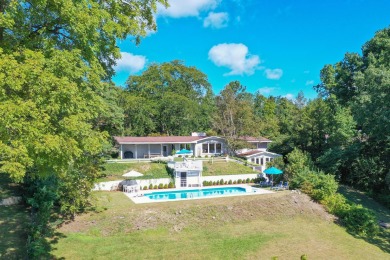 3 BD 2.5 BA 3,145-sq-ft home overlooks tranquil Mill Pond on Spruce Ridge Golf Club in Michigan - for sale on GolfHomes.com, golf home, golf lot