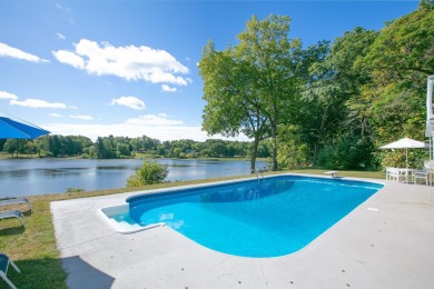 3 BD 2.5 BA 3,145-sq-ft home overlooks tranquil Mill Pond on Spruce Ridge Golf Club in Michigan - for sale on GolfHomes.com, golf home, golf lot