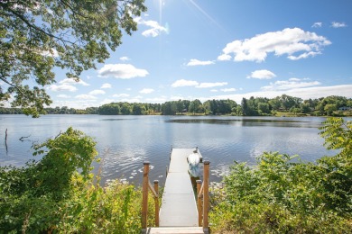 3 BD 2.5 BA 3,145-sq-ft home overlooks tranquil Mill Pond on Spruce Ridge Golf Club in Michigan - for sale on GolfHomes.com, golf home, golf lot