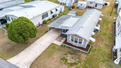 Pack your bags and come spend the winter or your retirement in on Betmar Acres Golf Club in Florida - for sale on GolfHomes.com, golf home, golf lot