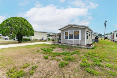 Pack your bags and come spend the winter or your retirement in on Betmar Acres Golf Club in Florida - for sale on GolfHomes.com, golf home, golf lot